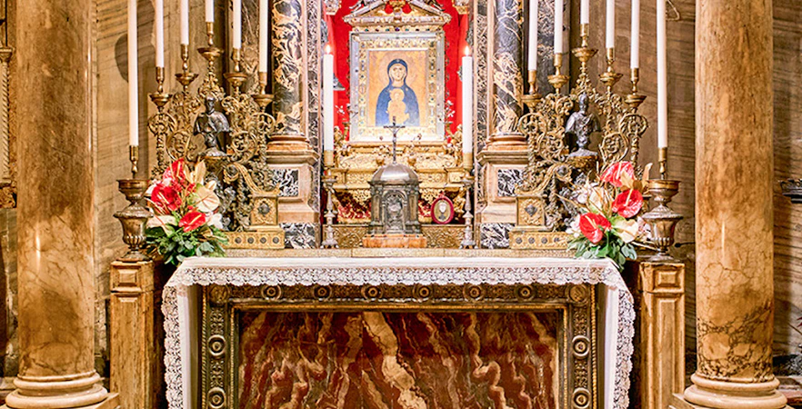 St. Mark's Basilica altar with religious iconography and ornate decorations in Venice, Italy.