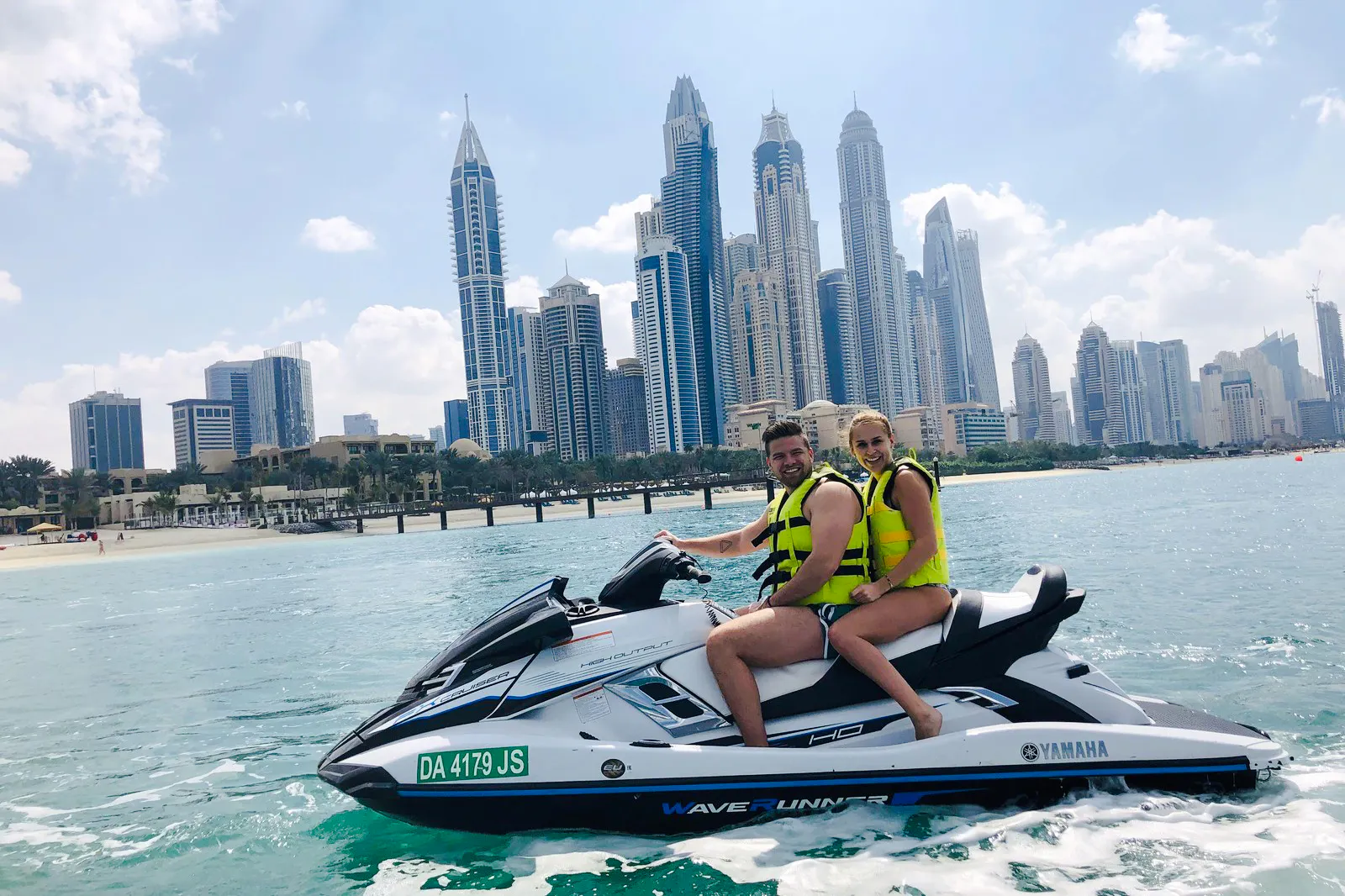 Jet ski ride with Burj Al Arab and Dubai skyline in the background.