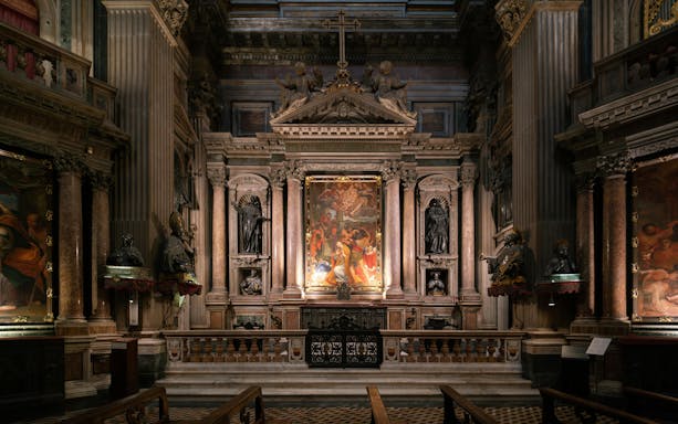 Royal Chapel of the Treasure of San Gennaro interior with ornate altar and religious artwork.