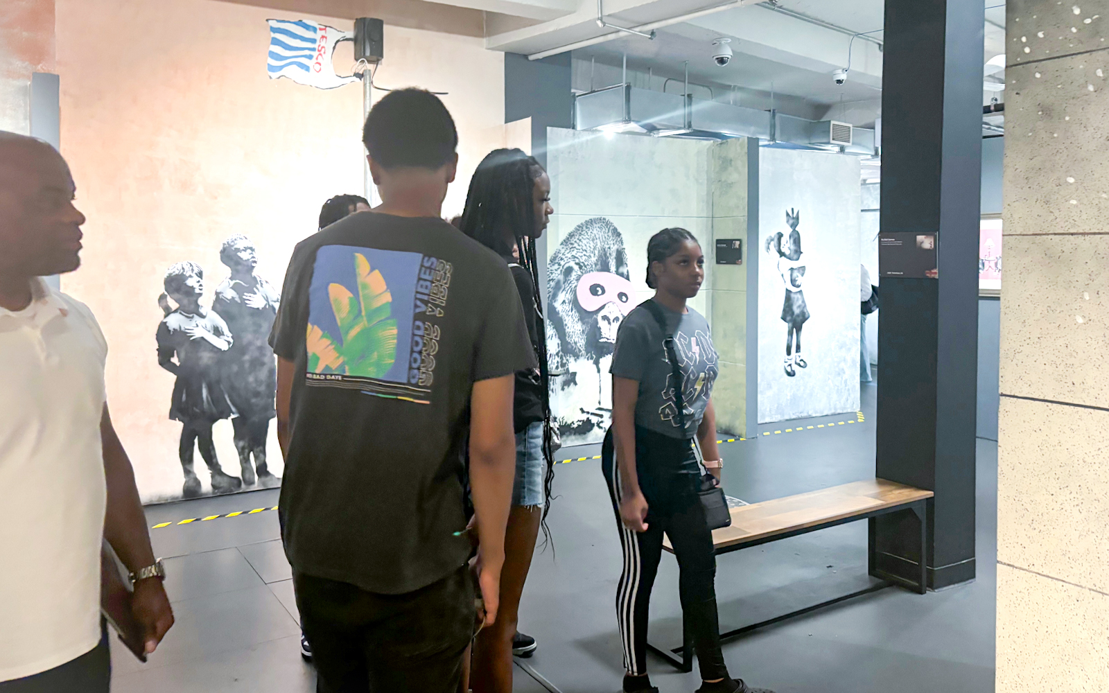 Visitors exploring Banksy artwork at the Banksy Museum.