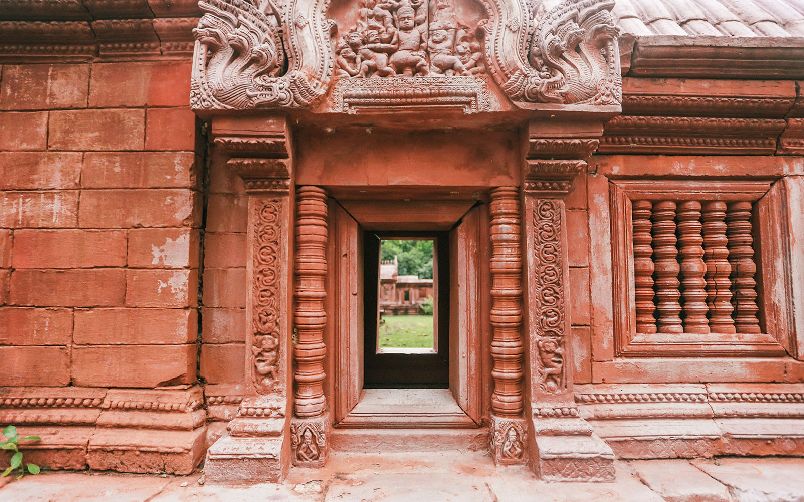 Ornate stone doorway at Ancient City on Erawan Museum tour, Thailand.