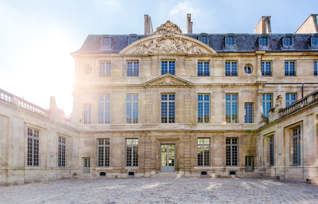 Visitors outside Picasso Museum, Paris, France.