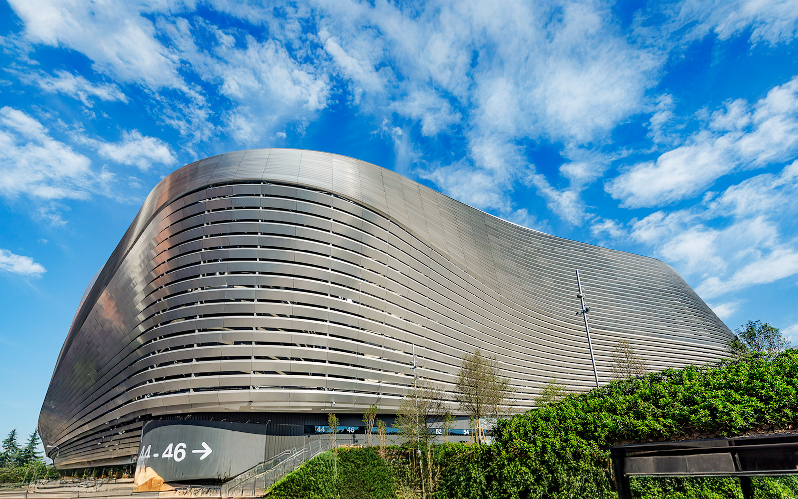Santiago Bernabeu stadium exterior with modern architecture in Madrid.