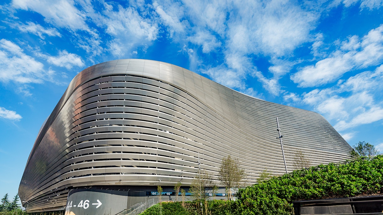 Santiago Bernabeu Stadium exterior with iconic architecture in Madrid, Spain.