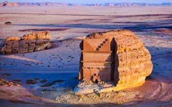 Hegra archaeological site in AlUla, Saudi Arabia, featuring ancient rock-cut tombs.