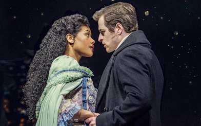 Actors in a dramatic scene from Phantom of the Opera production.