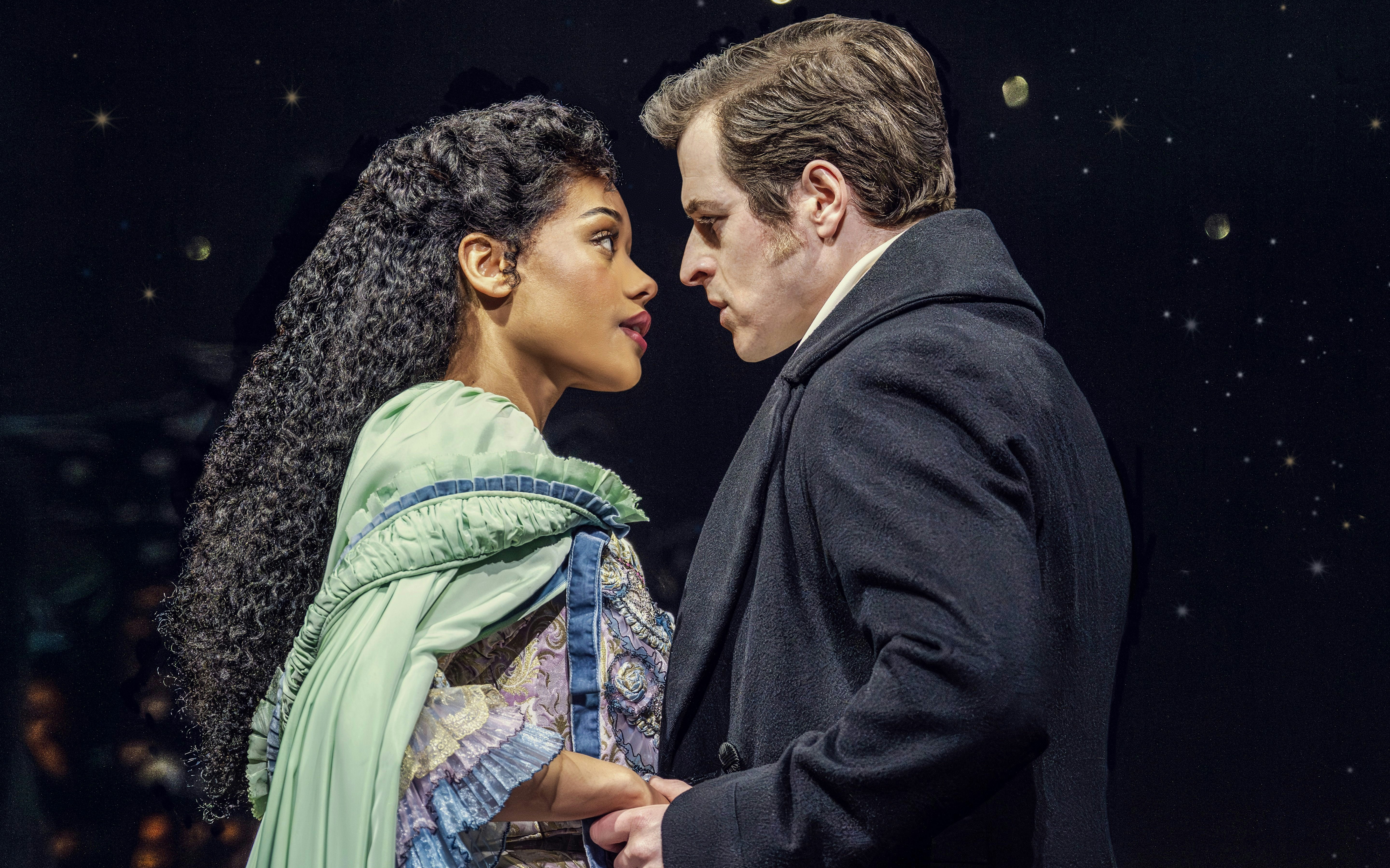 Actors in a dramatic scene from Phantom of the Opera production.