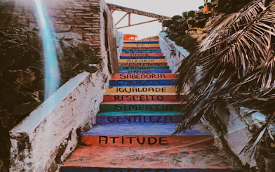 Colorful staircase with inspirational words in Canoa Quebrada, Sao Paulo.