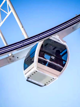 Asiatique Sky Ferris wheel cabin against blue sky, Bangkok, Thailand.
