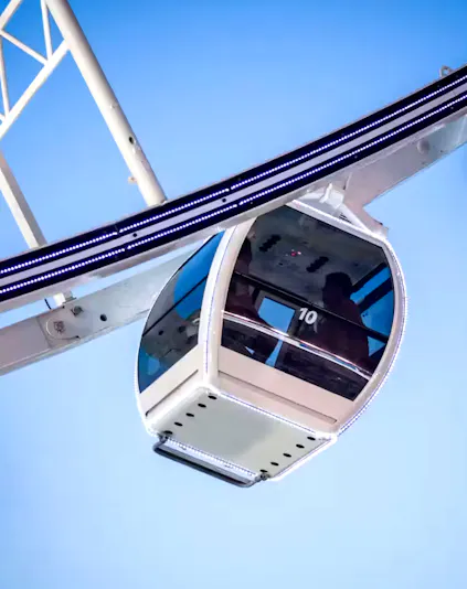 Asiatique Sky Ferris wheel cabin against blue sky, Bangkok, Thailand.
