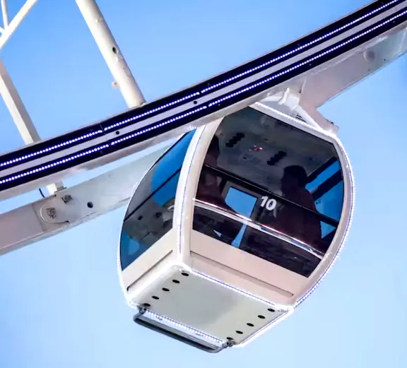 Asiatique Sky Ferris wheel cabin against blue sky, Bangkok, Thailand.