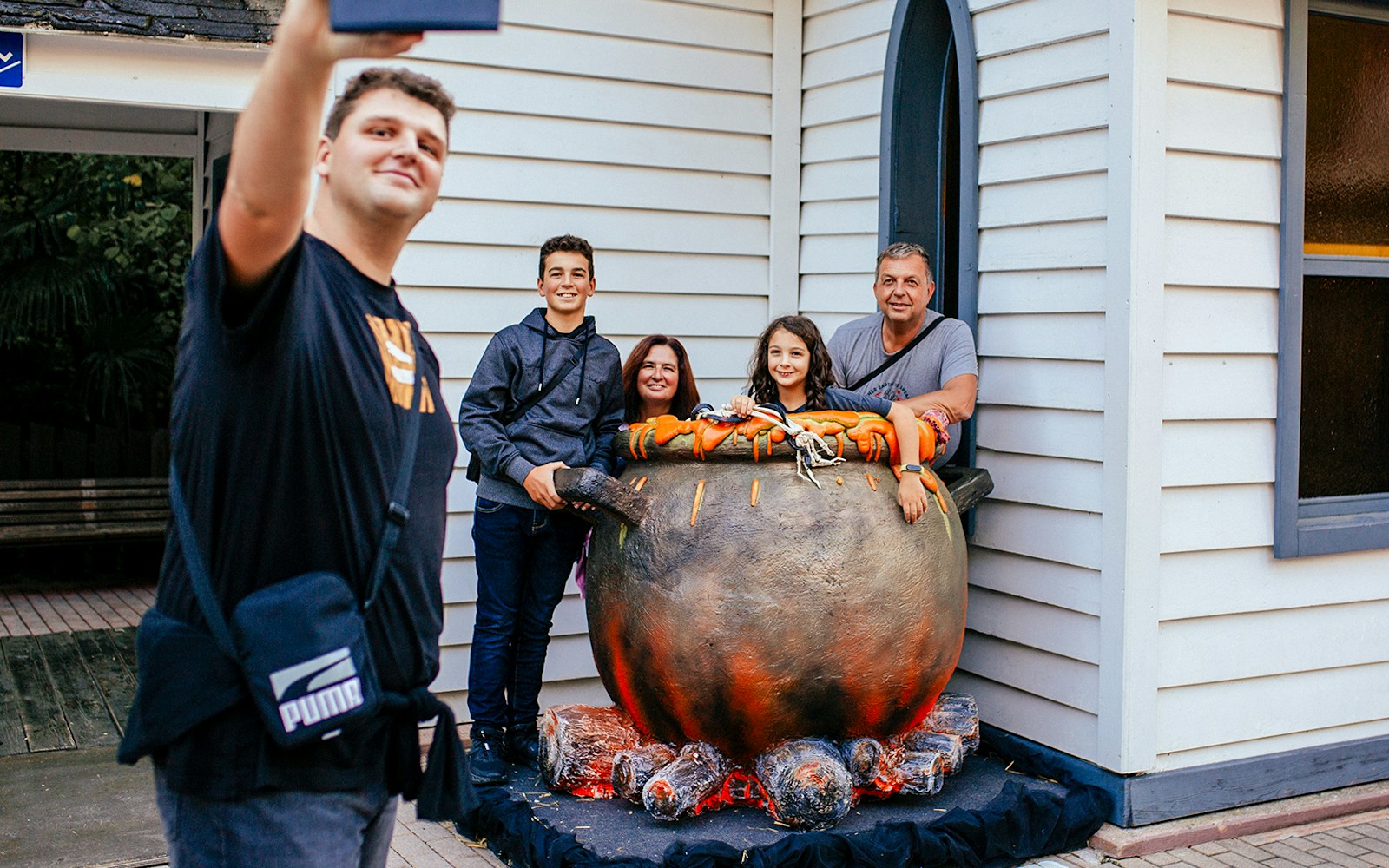 Halloween decorations at Gardaland amusement park featuring carved pumpkins and spooky figures