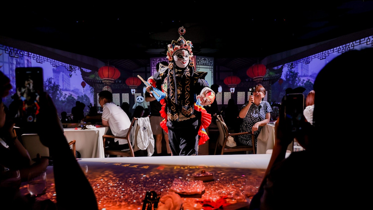 Performers at TASTE OF CHINA Immersive Restaurant, Shanghai, showcasing traditional Chinese opera.