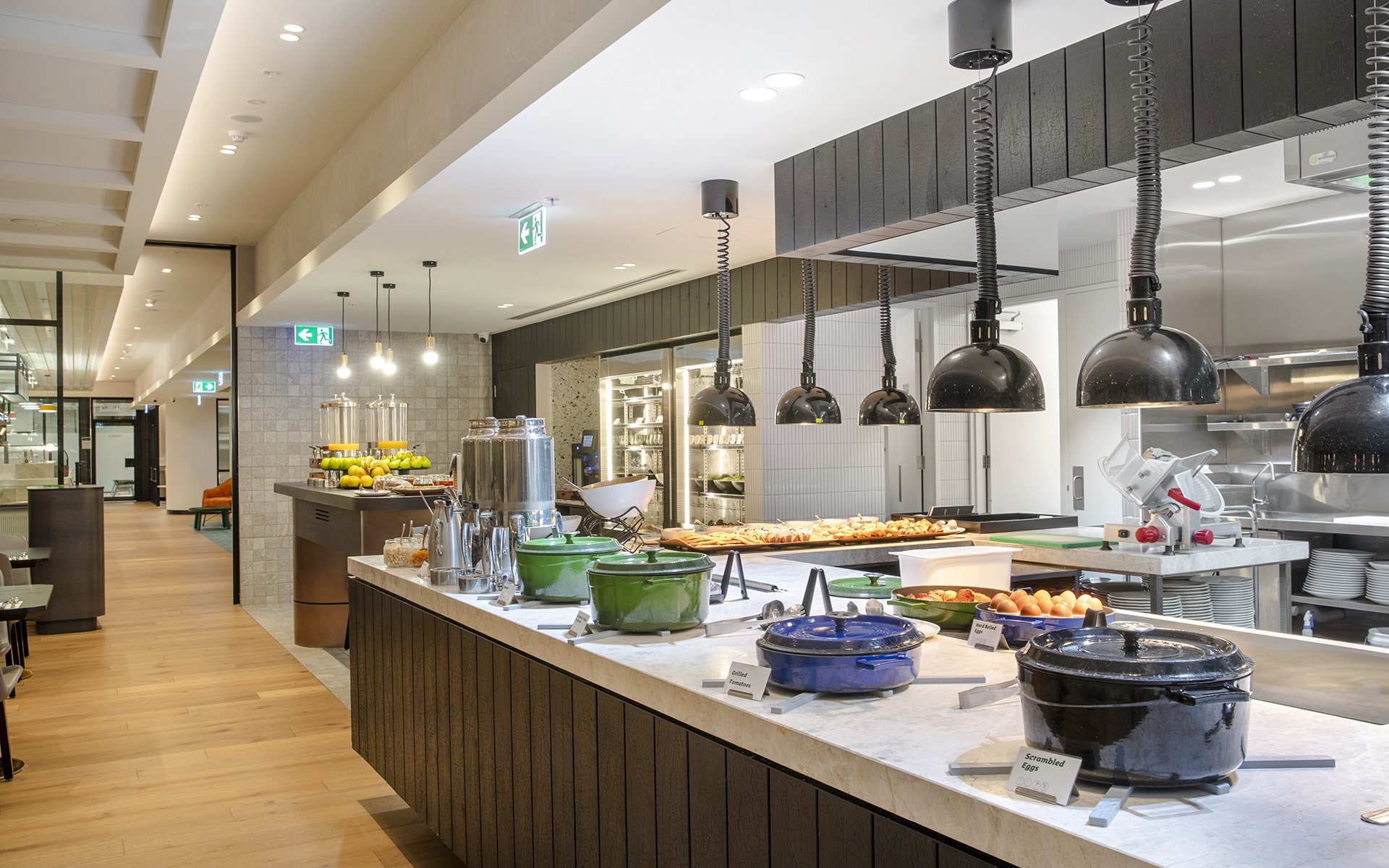 Buffet area at Holiday Inn & Suites Geelong with various food options and modern decor.