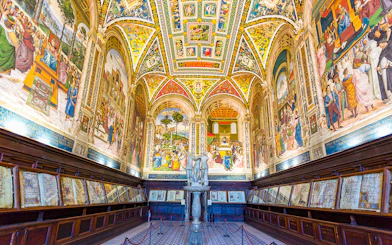 Siena Cathedral interior with vibrant frescoes and detailed architecture on the Gates of Heaven tour.
