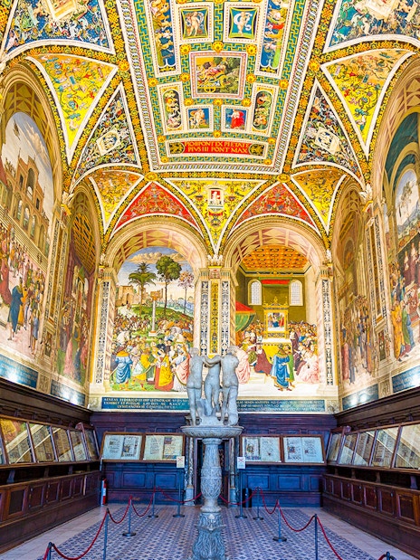 Siena Cathedral interior with vibrant frescoes and detailed architecture on the Gates of Heaven tour.