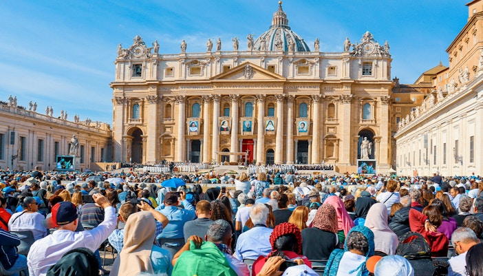 Crowd gathered at St. Peter's Basilica for new pope announcement, Vatican City.