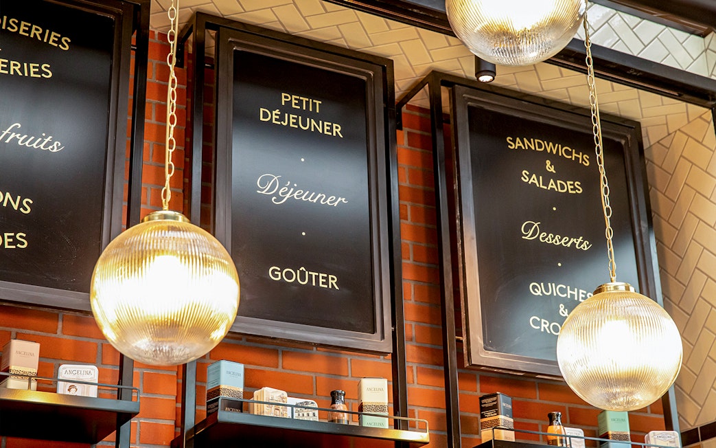 Rosalie’s Snack & Go menu boards with breakfast and dessert options.