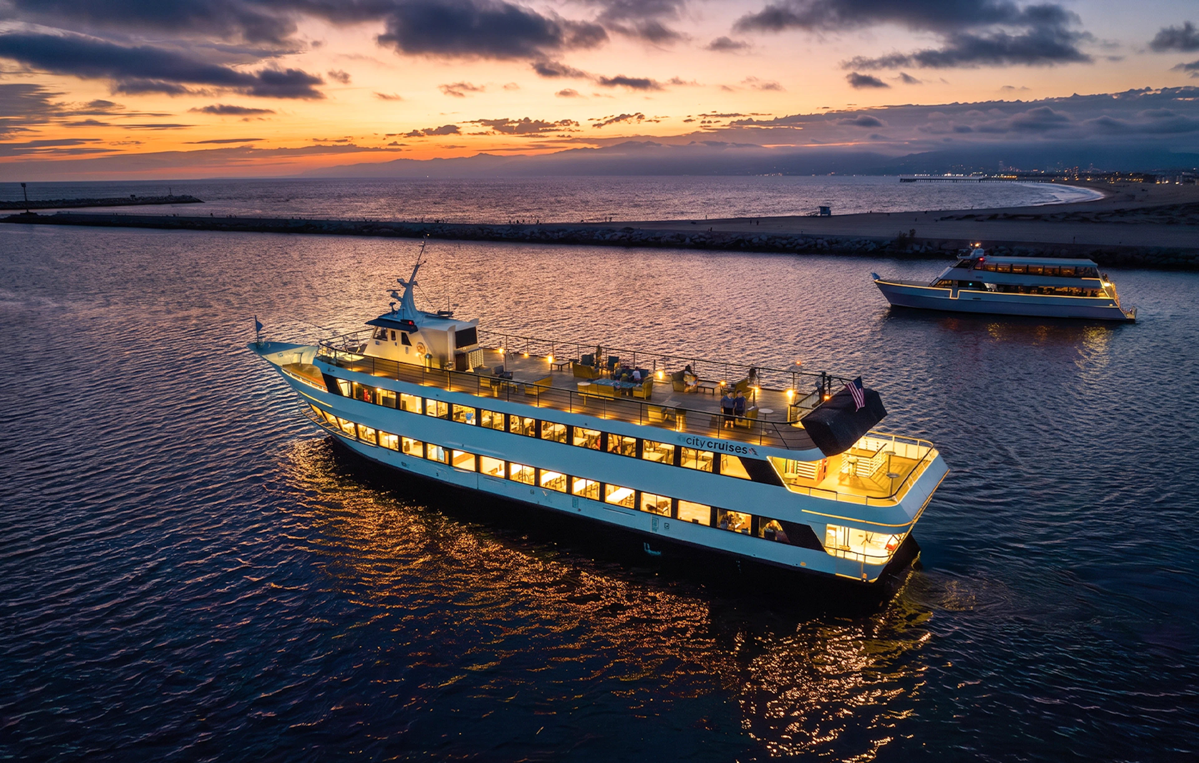 Dinner cruise ship at sunset in Marina del Rey, California.