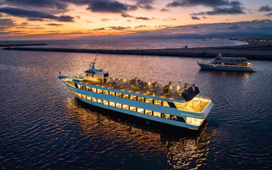 Dinner cruise ship at sunset in Marina del Rey, California.