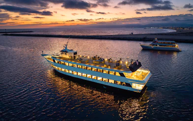 Dinner cruise ship at sunset in Marina del Rey, California.