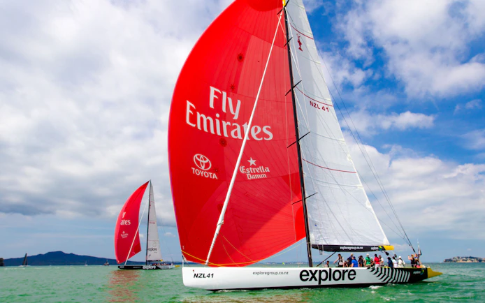 Sailing yacht on Auckland's Waitemata Harbour during America's Cup experience.