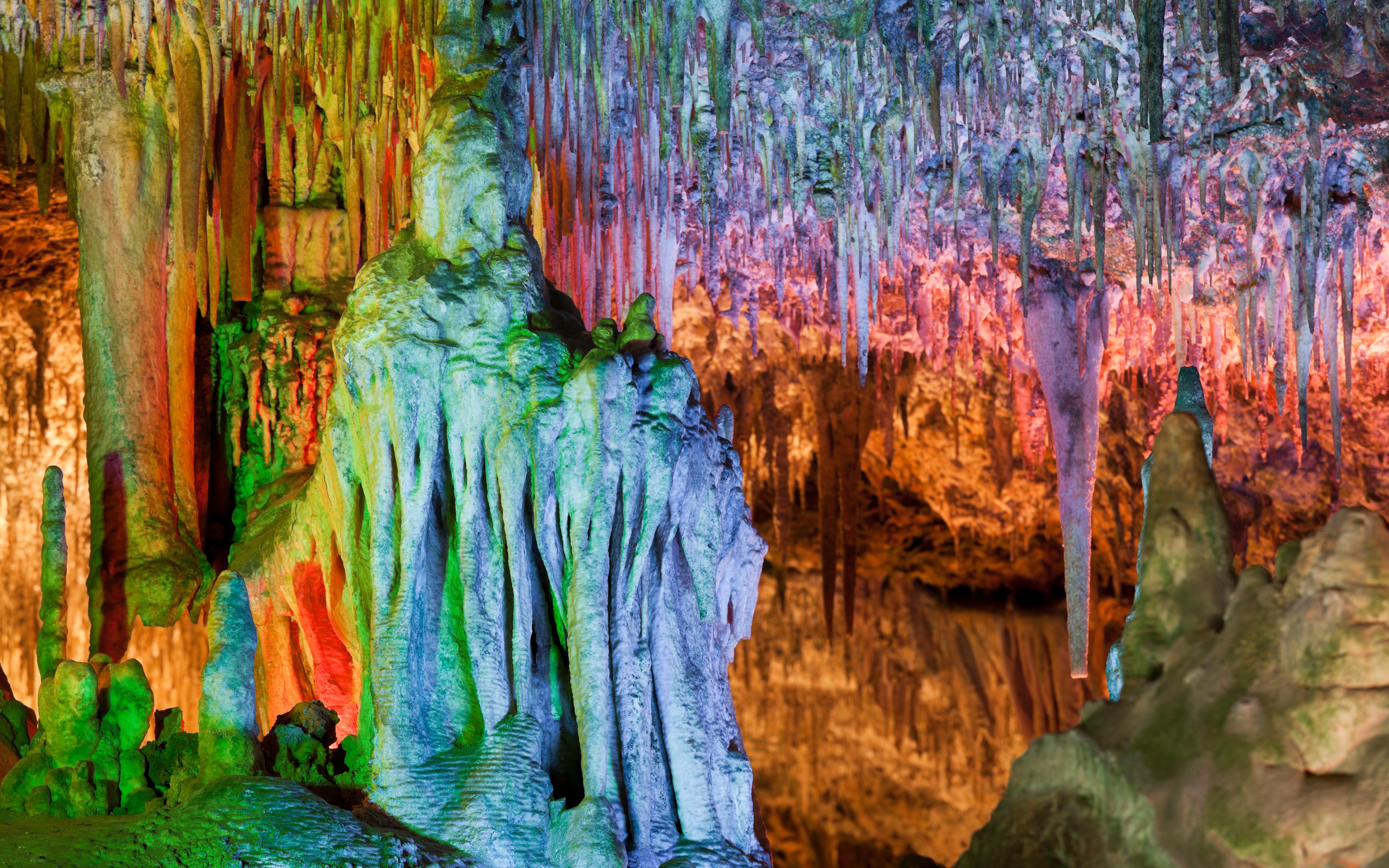 Colorful stalactites and stalagmites inside Drach Caves, Mallorca.