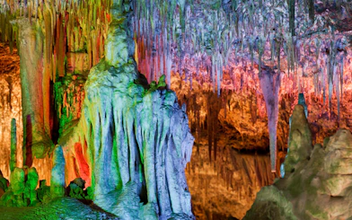 Colorful stalactites and stalagmites inside Drach Caves, Mallorca.