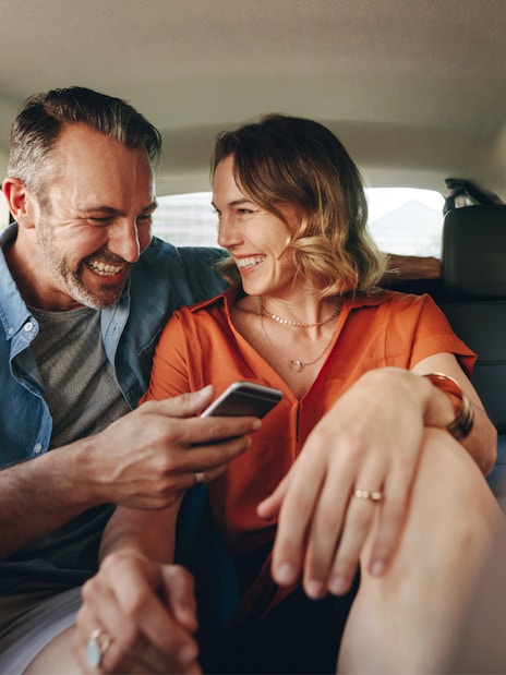 Couple enjoying private transfer to Andamanda Phuket Water Park.