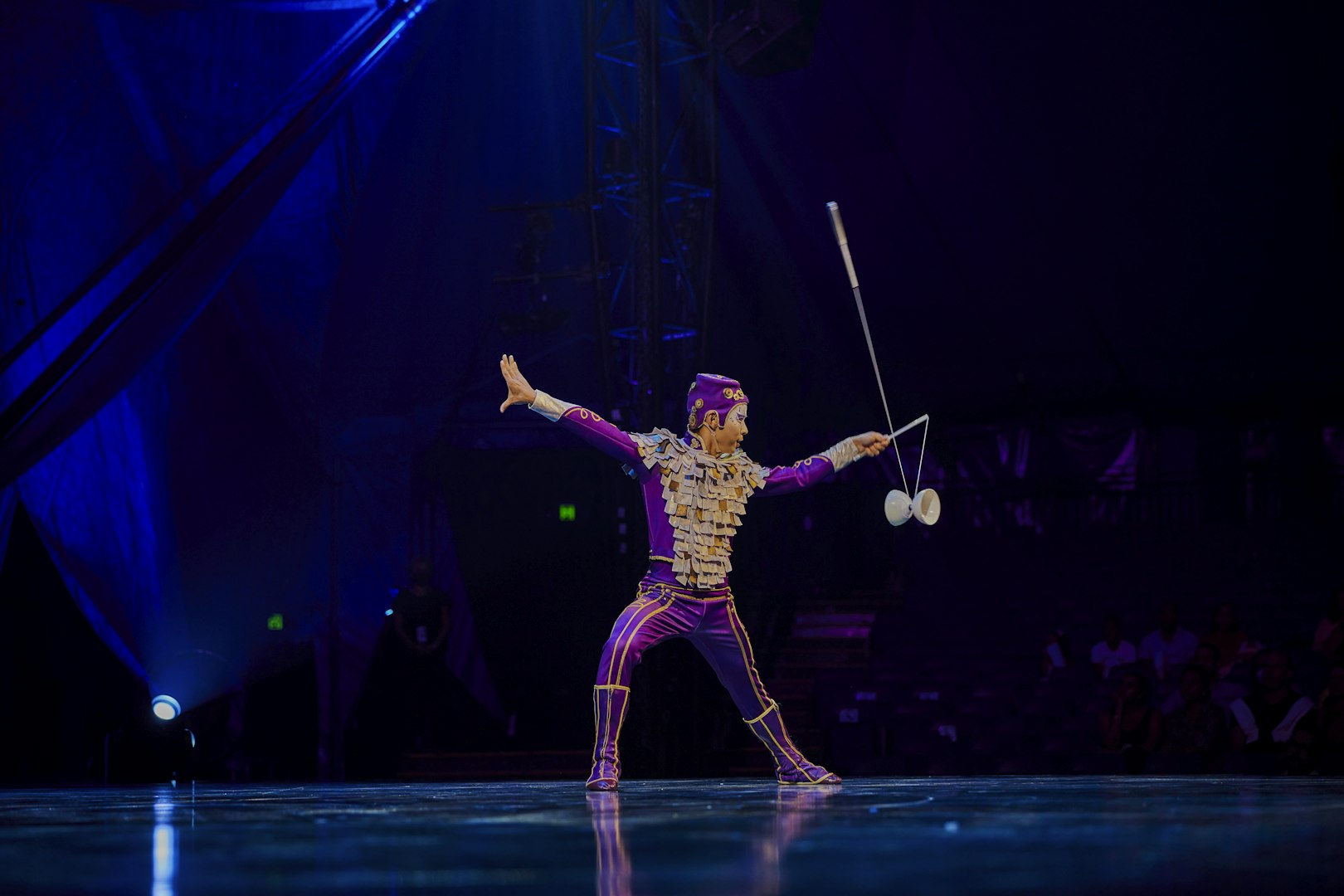 Performer juggling diabolo on stage at Kooza show in Brisbane.