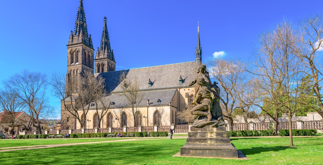 Neo Gothic Basilica of St Peter and St Paul in Vysehrad, Prague, with intricate spires and historic architecture.