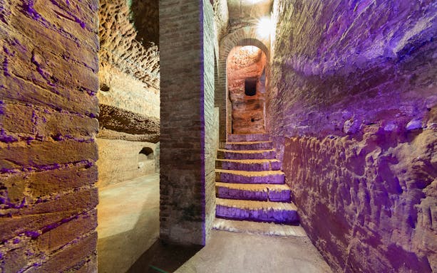 Underground passage with brick walls at Palazzo delle Papesse, Siena, Italy.