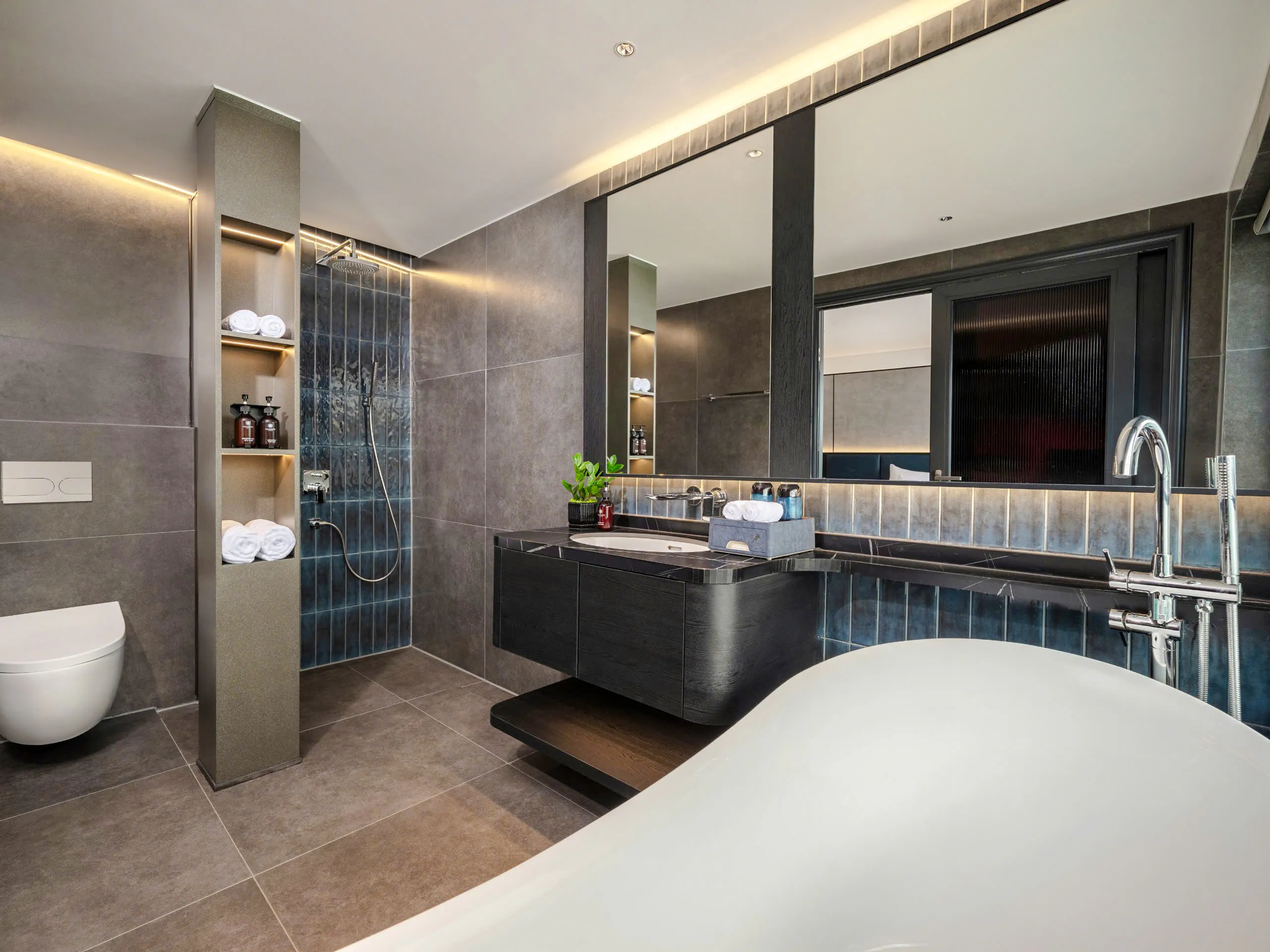 Luxurious bathroom with modern fixtures on a Halong Bay cruise.