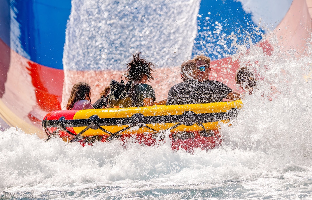 Guests enjoying a water ride at Thorpe Park London.