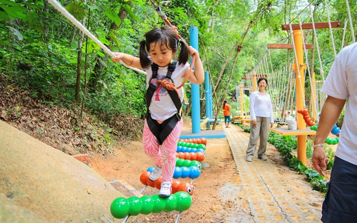 Child balancing on ropes at Monkey School, Escape Penang.
