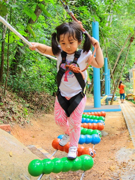 Child balancing on ropes at Monkey School, Escape Penang.