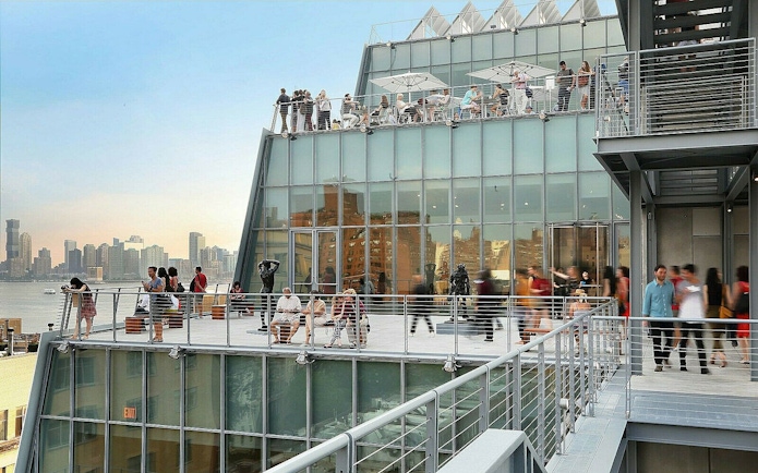 Whitney Museum of American Art terrace with visitors overlooking New York City skyline.