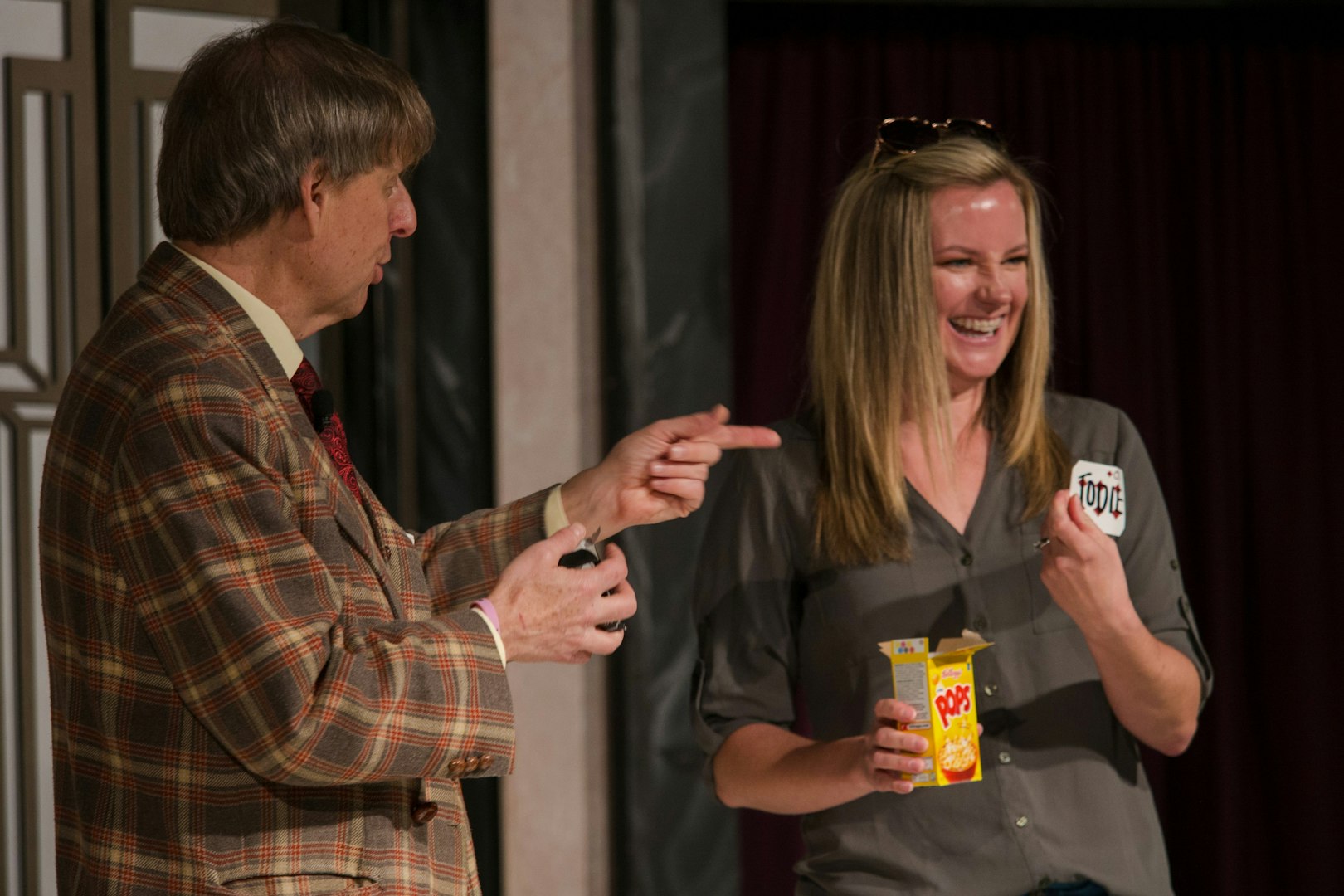 Magician interacting with audience member during The Mac King Comedy Magic Show in Vegas.