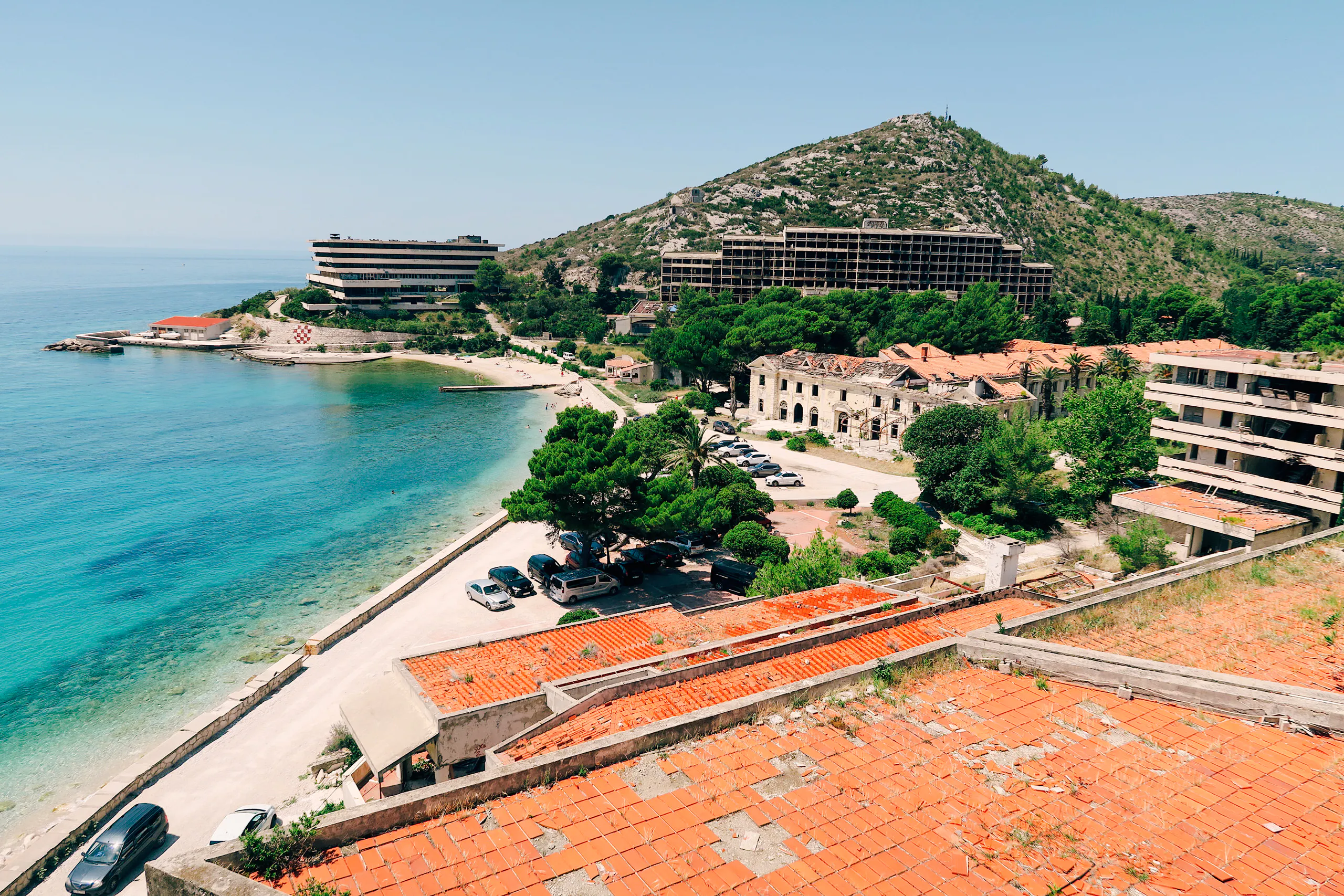 Abandoned hotels and coastline in Dubrovnik, highlighting Yugoslavia's breakup history tour.