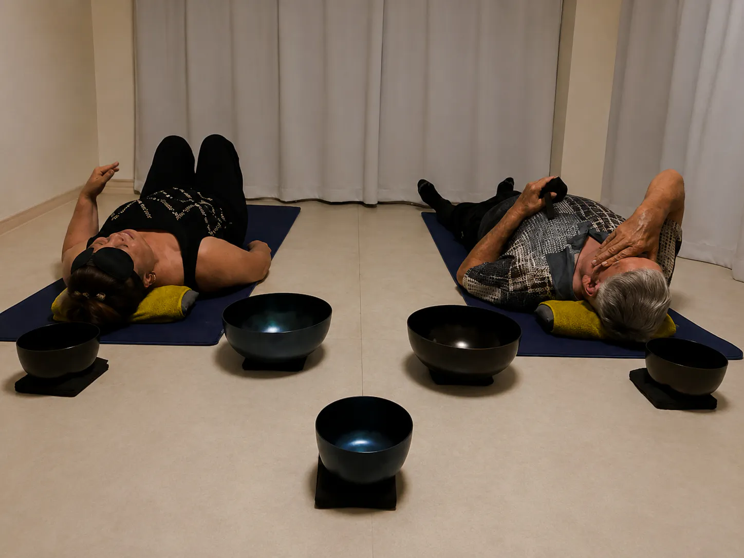 Participants lying on mats during a private Japanese sound bath meditation in Kyoto.