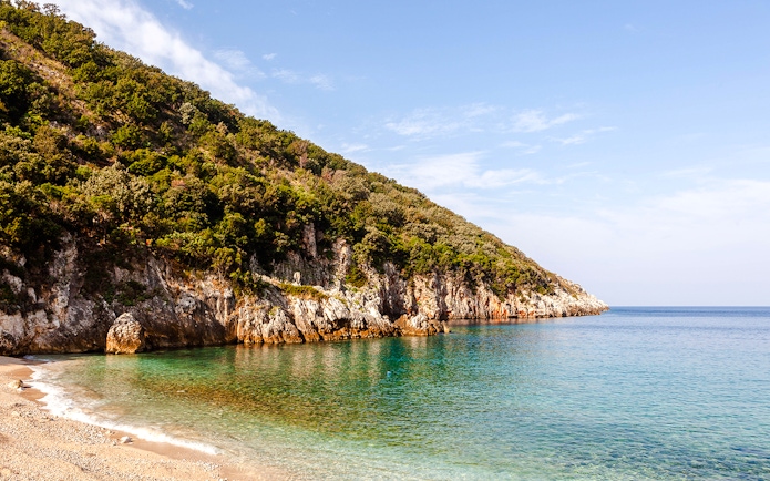 Bristan Bay coastline with clear water and rocky cliffs, Adriatic coast, Vlore county.