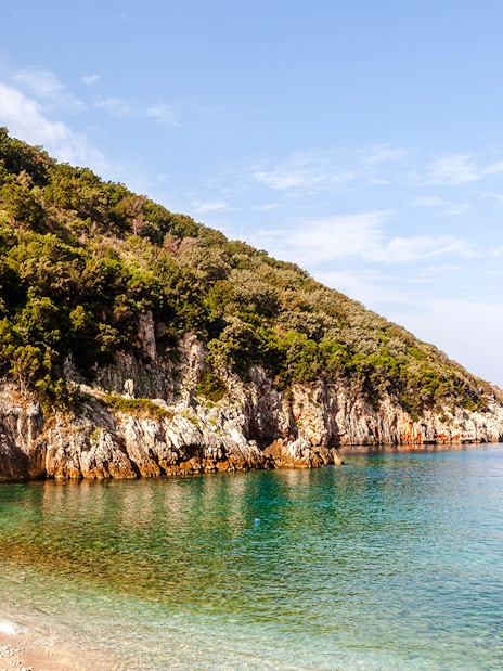 Bristan Bay coastline with clear water and rocky cliffs, Adriatic coast, Vlore county.