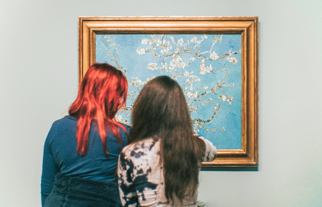 Visitors viewing Van Gogh's Almond Blossom painting at the Van Gogh Museum.