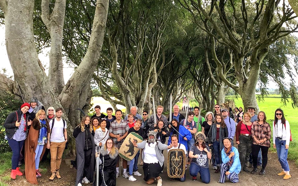 Tour group at Dark Hedges, a Game of Thrones filming location in Belfast.
