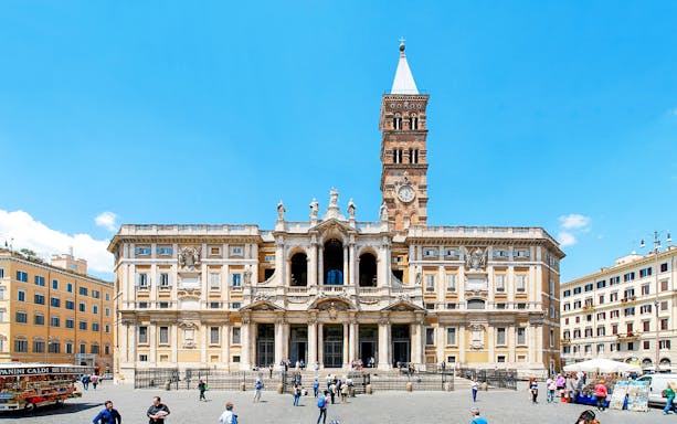 Basilica Santa Maria Maggiore in Rome with tourists in the foreground.