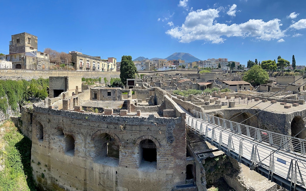 Herculaneum ruins with Mount Vesuvius in the background, Italy.