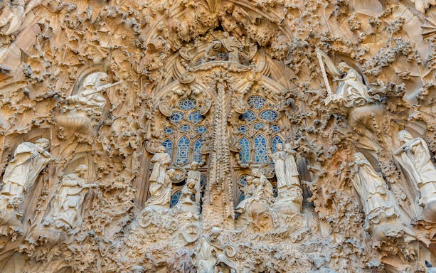 Sagrada Familia Nativity Facade with intricate sculptures in Barcelona, Spain.