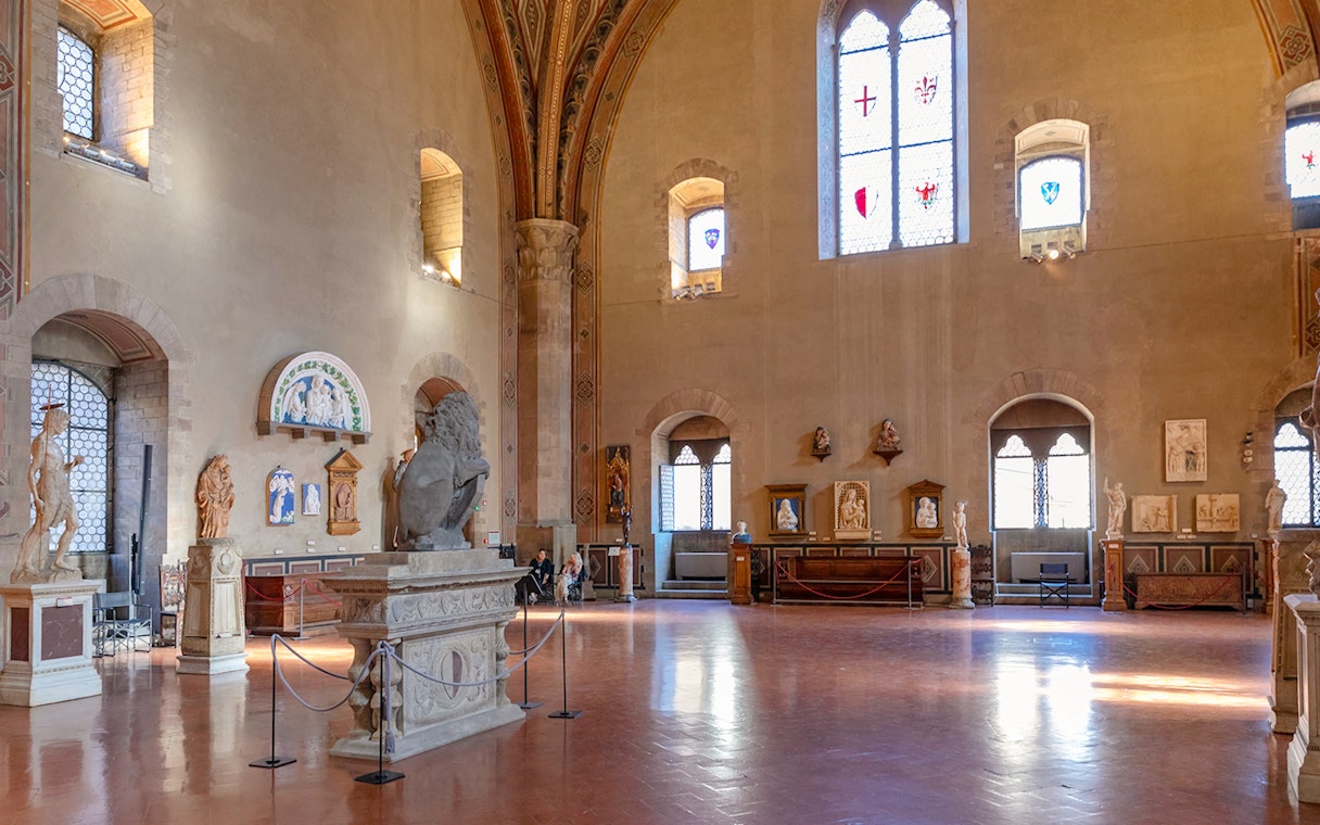 Interior of Museo del Bargello in Florence, showcasing sculptures and Renaissance art.