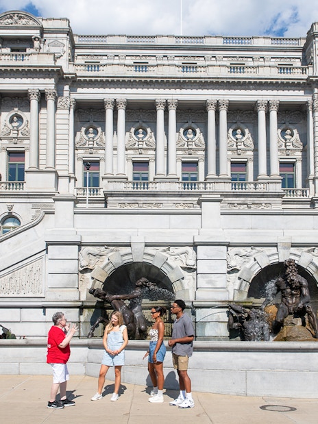 Tour group at the Library of Congress, Washington DC, with Neptune Fountain in foreground.