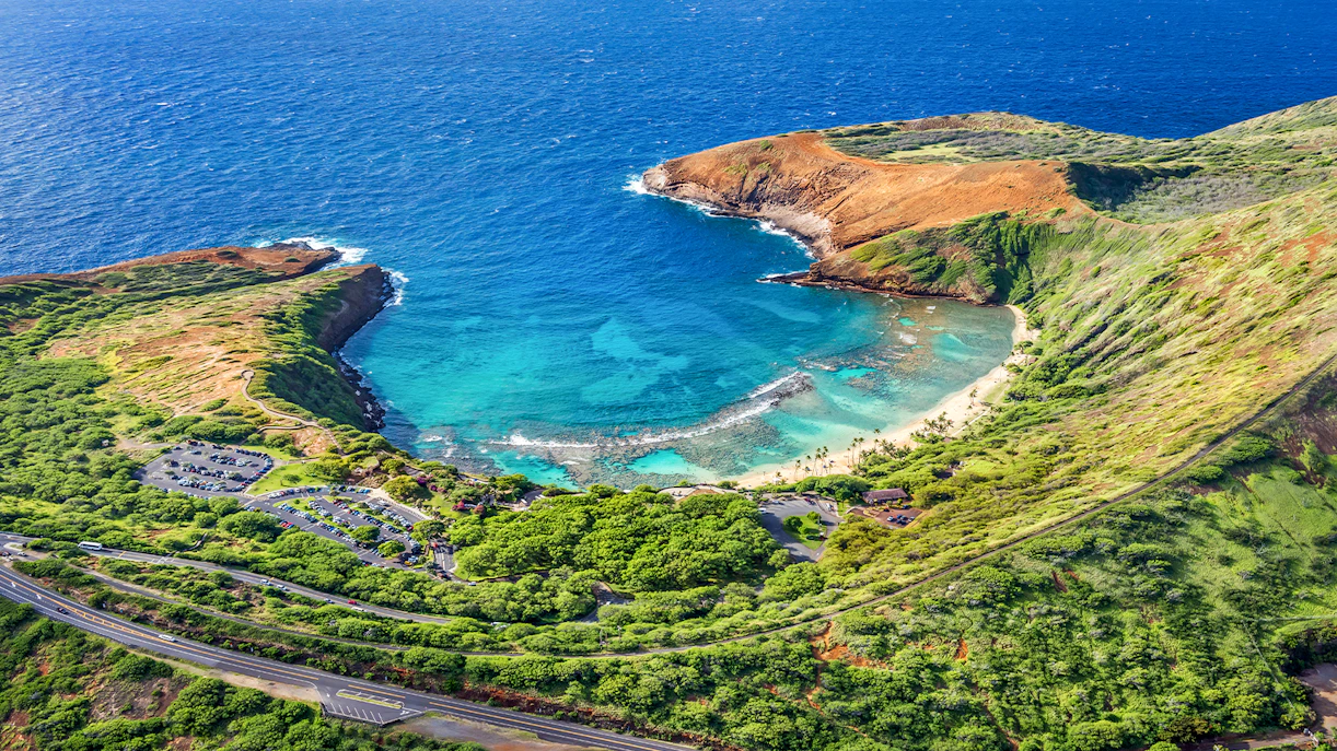 Aerial view of Hanauma Bay's turquoise waters and surrounding greenery, Oahu, Hawaii.